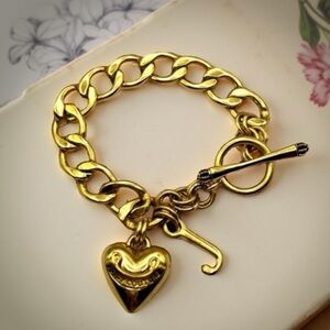 Vintage Juicy Couture Gold Tone Charm Link Toggle Bracelet 7.5" EUC